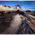 Frosted dunes and shattered peaks