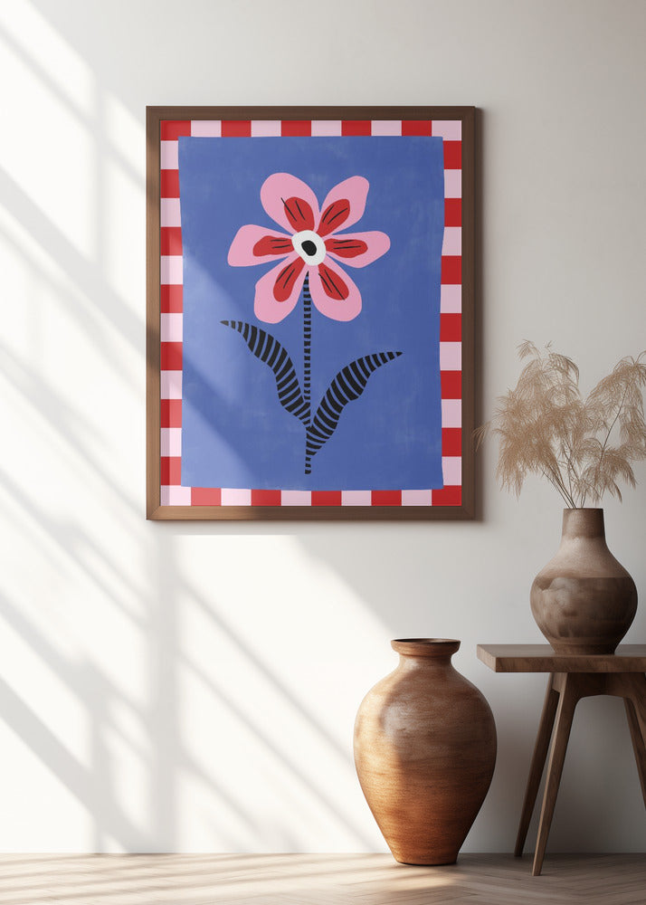 Flower with Pink Petals and Striped Leaves