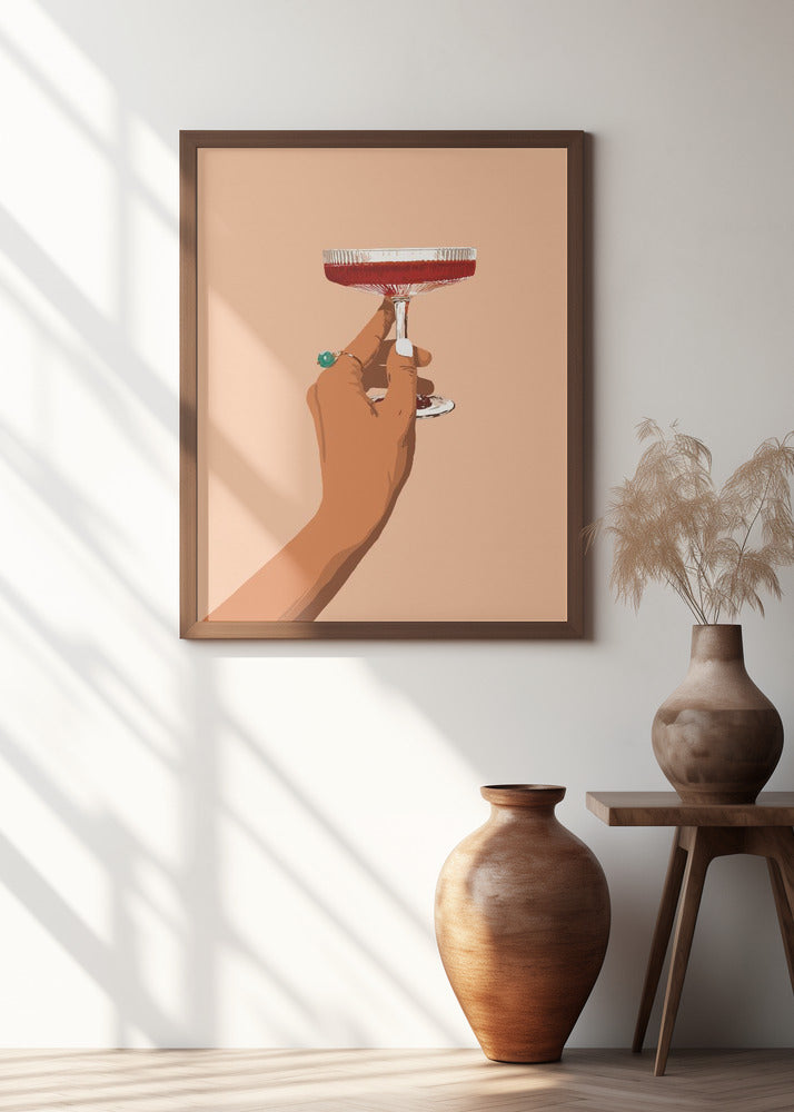 A Hand Holding A Glass Of Red Wine