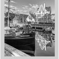 Boats Docked At The Canal